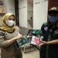 Penyerahan Masker dari Lembaga Lingkungan Amphibi 